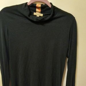 Women's burberry, mock turtle neck..long sleeve shirt..size medium